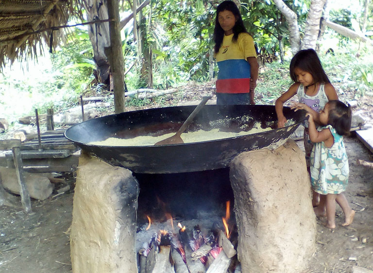 Roasting yuca to make farina